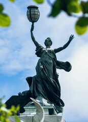 statue that is at the top of the monument to the heroes in the centennial park of guayaquil,...