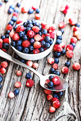 berries over wooden table
