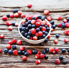 berries over wooden table