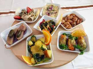 Traditional Turkish appetizer foods (Turkish meze) on the restaurant table.