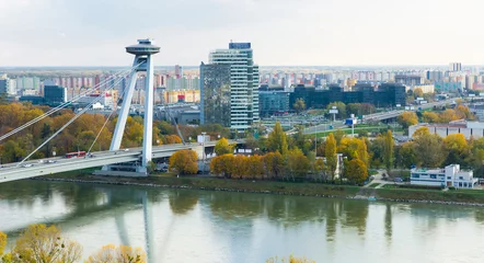 Foto auf Acrylglas Aerial view of Bratislava with famous Bridge SNP in autumn cloudy day © JackF