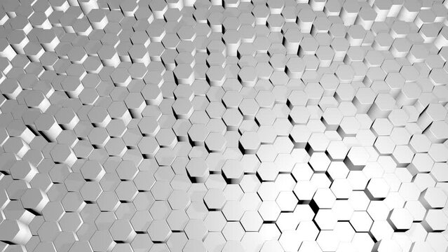 Abstract background with waves made of white futuristic honeycomb mosaic geometry primitive forms that goes up and down under spot lighting. 3D illustration. 3D CG. High resolution.