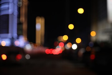 Blurred view of cityscape with bokeh effect. Night life