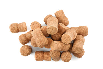 Heap of sparkling wine corks on white background, top view