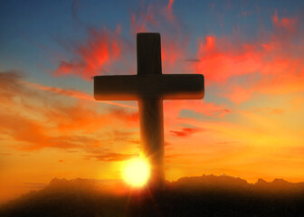 Fototapeta na wymiar Silhouette of Christian cross outdoors at sunset