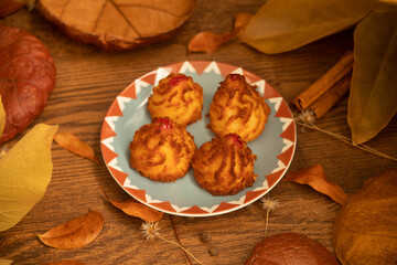 Traditional coconut dessert of the autumn and Christmas season, known as coconut bites, coconut candy, baked coconut and mini coconut sighs