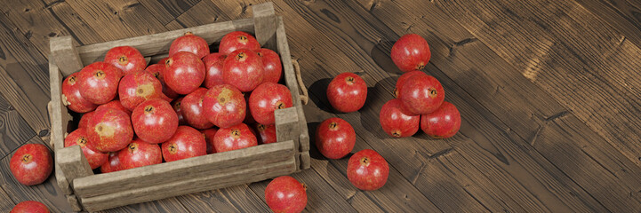 Fototapeta na wymiar pomegranates, juicy fruits in a wooden crate on wooden background banner
