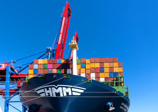 HMM Algeciras-class container ship loaded with containers in the Port of Hamburg, Germany