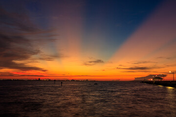 Fototapeta na wymiar Orange Sky morning over the Pier