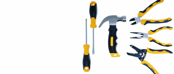 different type of yellow black screwdrivers and hammer hand tools flat lay isolated white background with copy space 