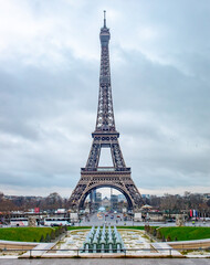 Fototapeta premium Romantic Eiffel Tower on a cold cloudy Paris France morning