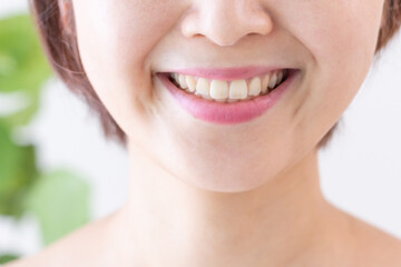 Obraz premium 笑顔の女性（美容・歯・ホワイトニング）