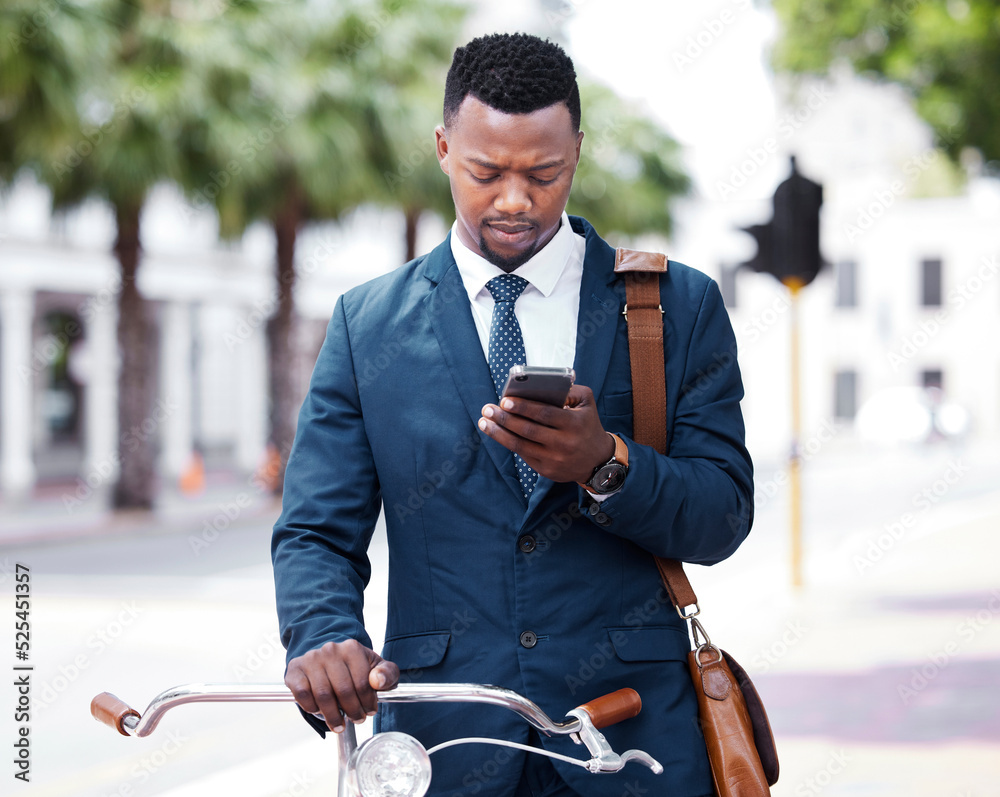 Poster reading, texting or web search on a phone of a business man ready to ride a bike to work or home. di
