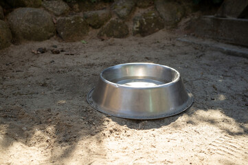 dog bowl of water in a public place for visitors with animals