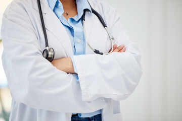 Medical healthcare doctor, woman worker or employee arms crossed standing confident with...