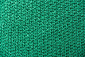 Knitted hemp fabric. Brown woven background.