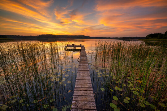 Beautiful summer sunrise over lake