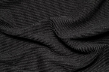 Close-up of black cloth texture background
