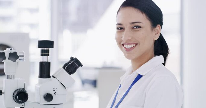 Research, bacteria and science intern with microscope working on medical, dna and innovation in laboratory. Happy scientist looking at chemistry, tissue and futuristic medicine development tests - Powered by Adobe