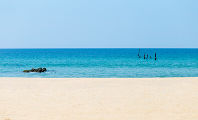 Peaceful tropical beach in south of Thailand, clean fine sandy beach in summer, empty beach