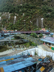 Fototapeta na wymiar A town in the Andes, prefabricated houses with metal roofs