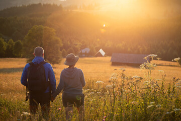 Joyful couple relaxing in nature