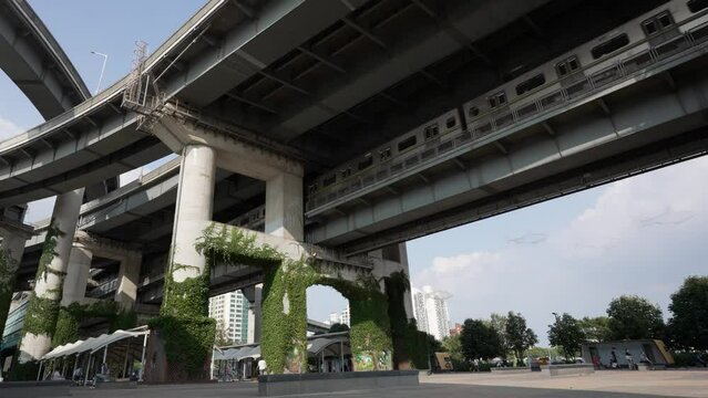 Seoul subway train departing from Ttukseom Hangang Park station toward Cheongdam station moving on Cheongdam double deck Bridge