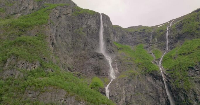 Kjelfossen Waterfall Flowing From Sheer Cliffs Near Gudvangen, Norway. Low Angle