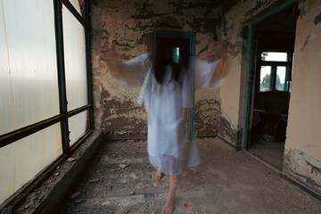 Scary ghost woman in haunted house