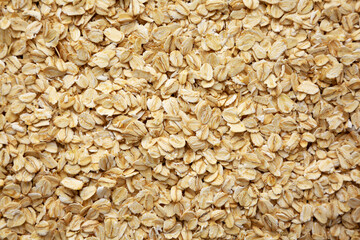 Dry Organic Rolled Oats Background