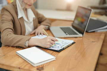 Woman hands holding a sell home model, concerning mortgage loan offer for and house insurance concept.