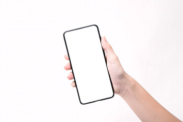 Woman hand holding the black smartphone with blank screen  isolated on white background