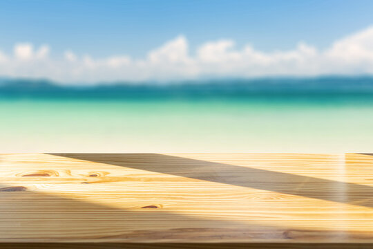 Top Of The Wood Table In Front Of The White Beach Background. - Can Be Used For Display Or Montage Your Products.