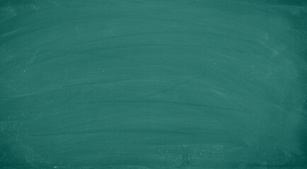 Abstract Green Chalk rubbed out on blackboard for background. texture for add text or graphic design. Education concepts school.