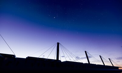 cable stayed bridge silhouette with stars