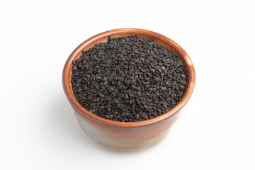 poppy in brown cup on white background