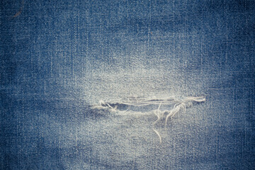 Retro color tone of blue denim jeans fabric texture for background website fashion design or...