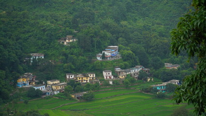 Fototapeta na wymiar uttarakhand houses in green hills outdoor shoot hd.