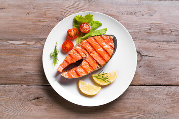 Grilled salmon steak with vegetable salad