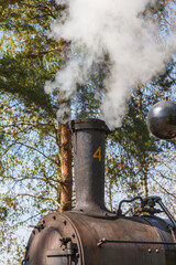 Steam from the chimney of an old steam locomotive © Lars Johansson
