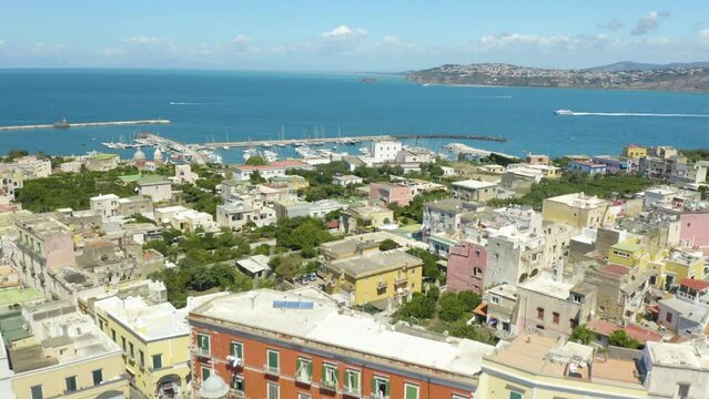 Aerial Pullback Reveals Procida, Italy. A Beautiful Island off the Coast of Napoli