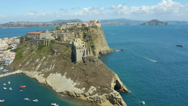 Aerial Rotating Shot Above Steep Cliffs in Procida, Italy. Summer