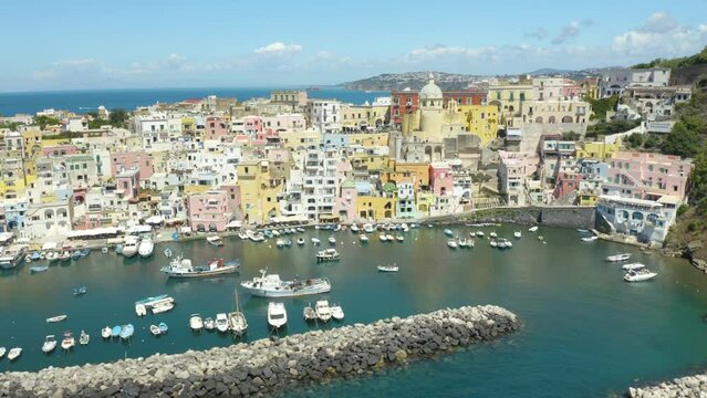 Establishing Shot of Typical Italian Town - Procida, Campania, Italy. Rotating Drone View
