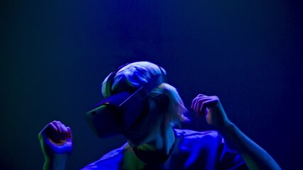 Man gaming moving in invisible space using VR. Future and entertainment concept