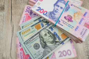 Fototapeta na wymiar dollars and hryvnia banknotes.