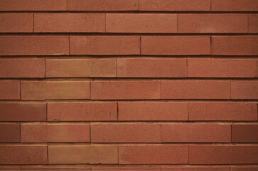 Brown brick tile wall texture background. Stylish and modern exterior or interior backdrop design.