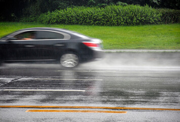 car driving in the rain