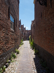 The Kuiperspoort is a narrow street in Middelburg, the Netherlands and the houses are from the 17th and 18th century. The name refers to the coopers guild from the 17th century