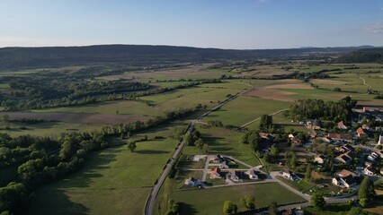 Village et bocage vus du ciel en fin de journée © Cyril