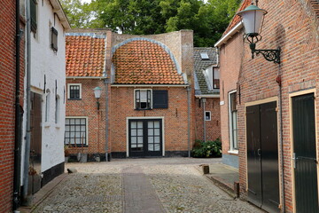 Traditional historic medieval houses in the old picturesque fortified town of Elburg, Gelderland, Netherlands